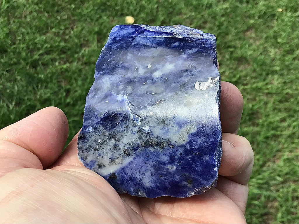 216g Sodalite with Graphite One Side Polished 2C