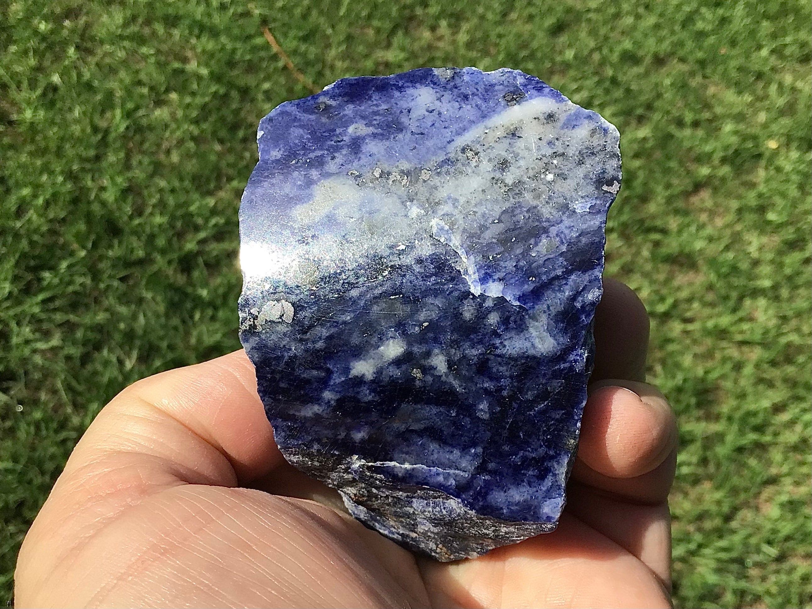 216g Sodalite with Graphite One Side Polished 2C