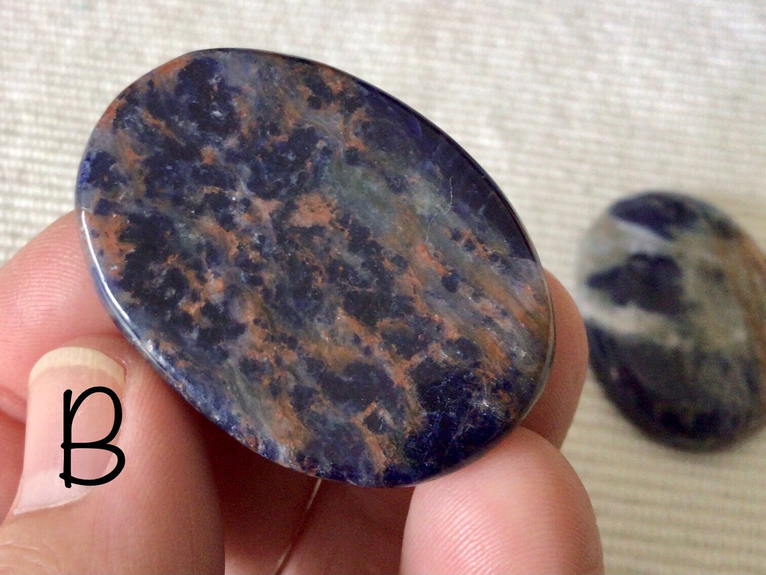 Sunset Sodalite Thumb Stone Group 11