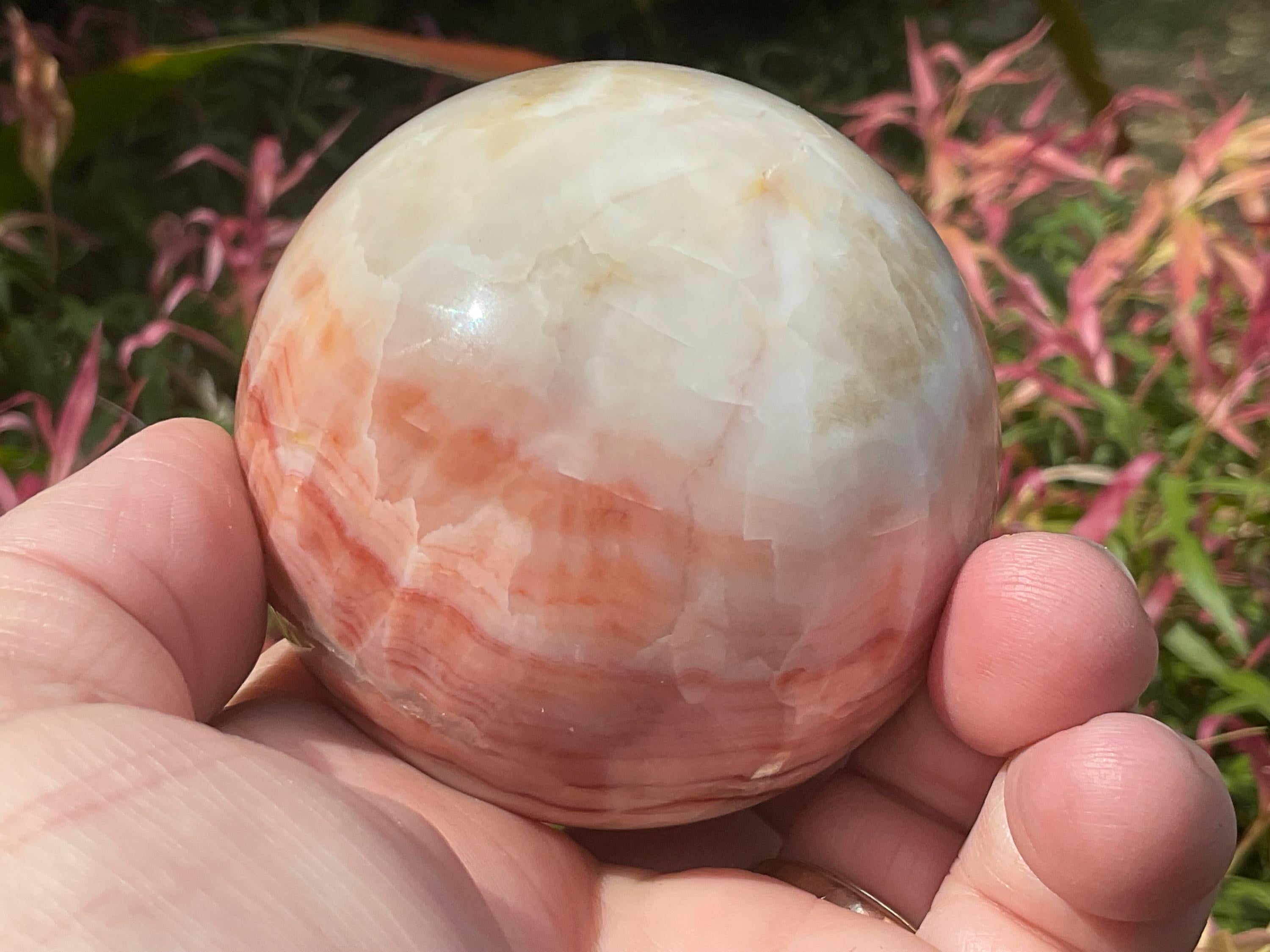 390g (6cm diameter) Red Banded Calcite Sphere B