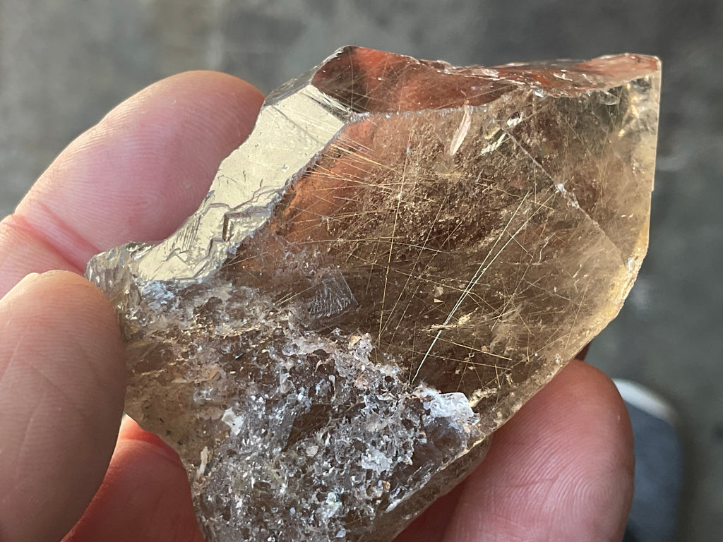104g Golden Rutile in Smokey Quartz Rough Point