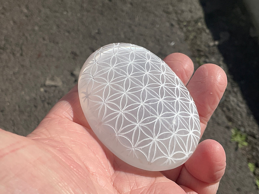 115g Flower of Life Etched Selenite Palmstone 1B