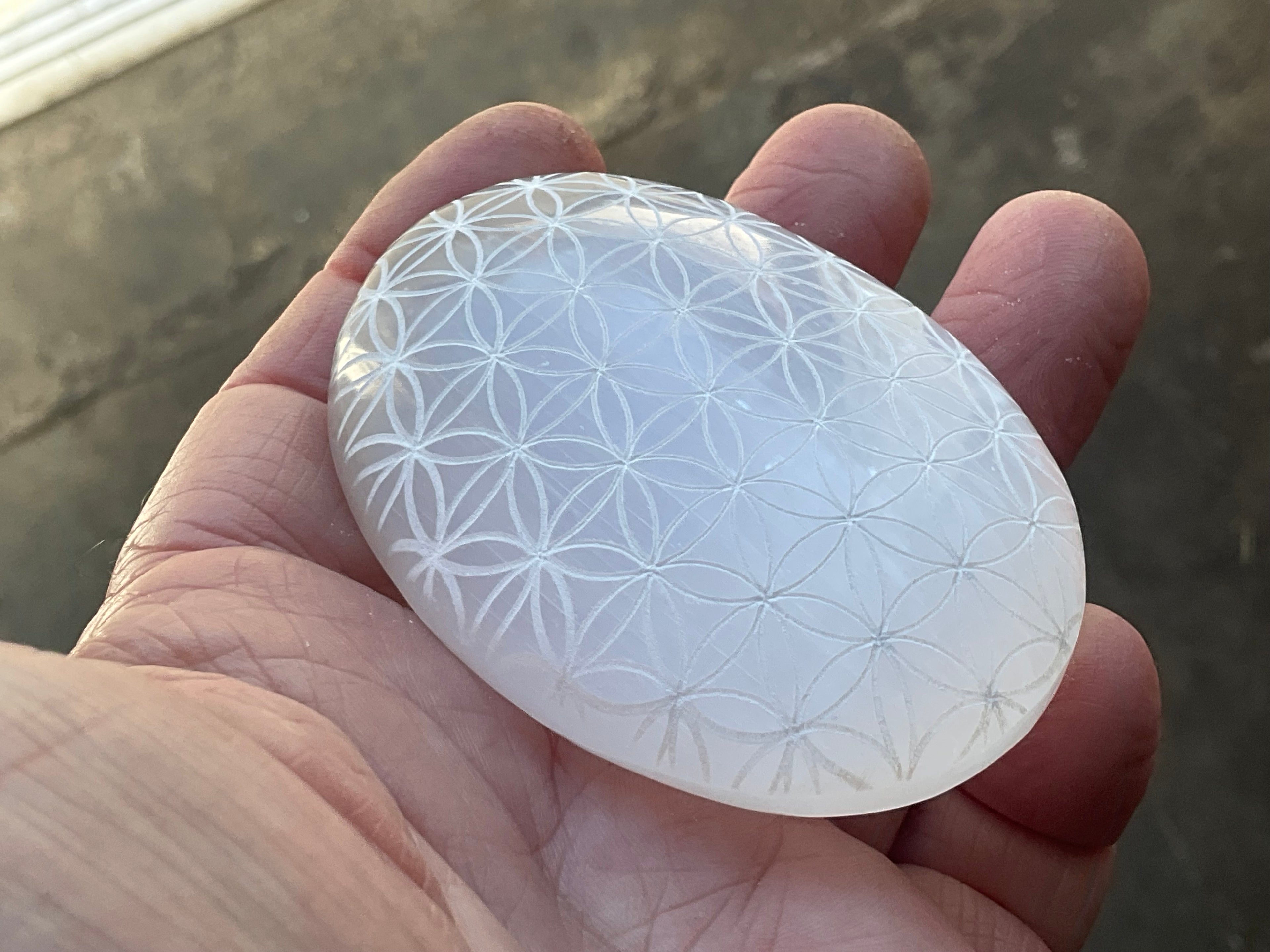 115g Flower of Life Etched Selenite Palmstone 1B