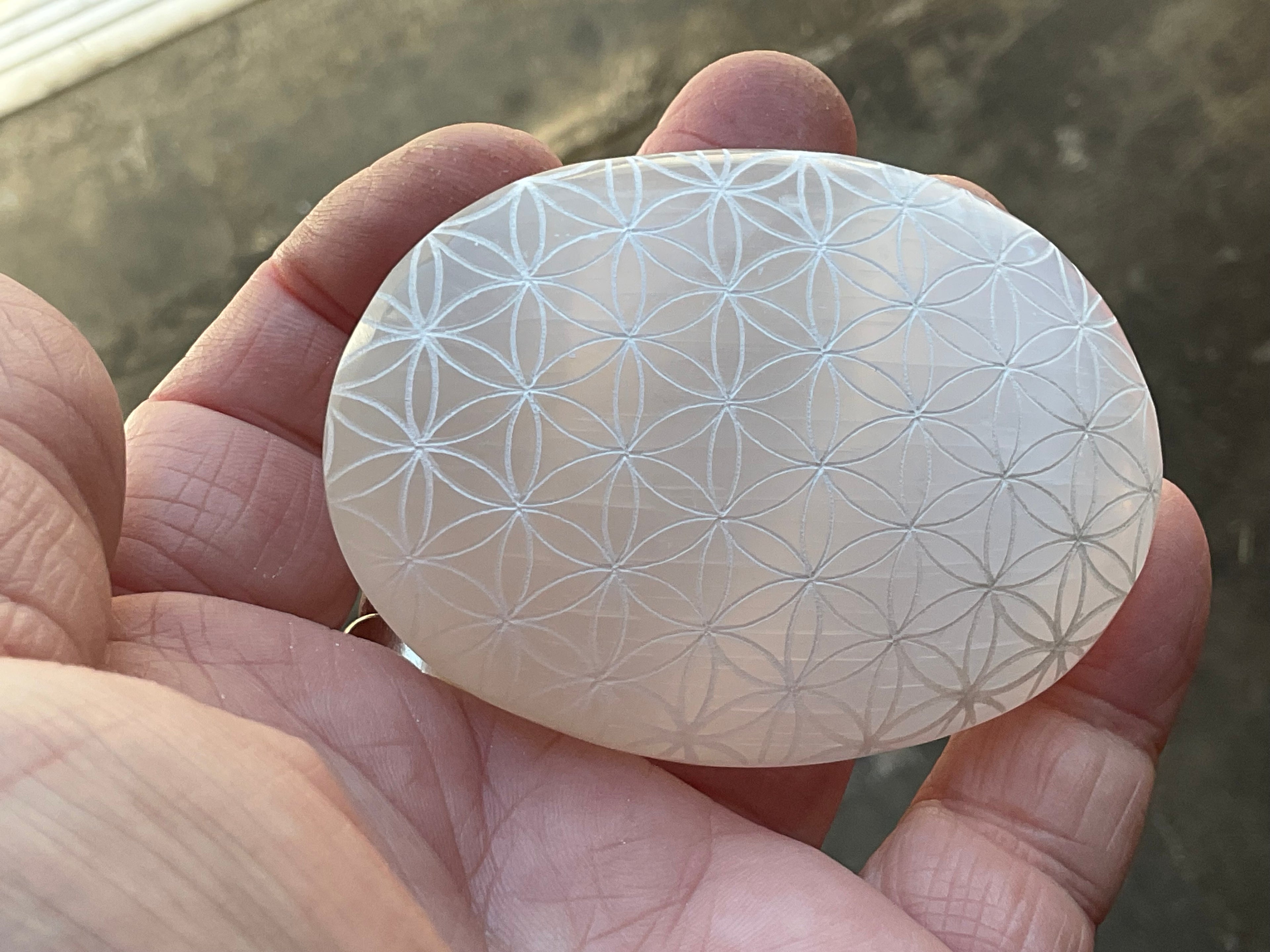 115g Flower of Life Etched Selenite Palmstone 1B