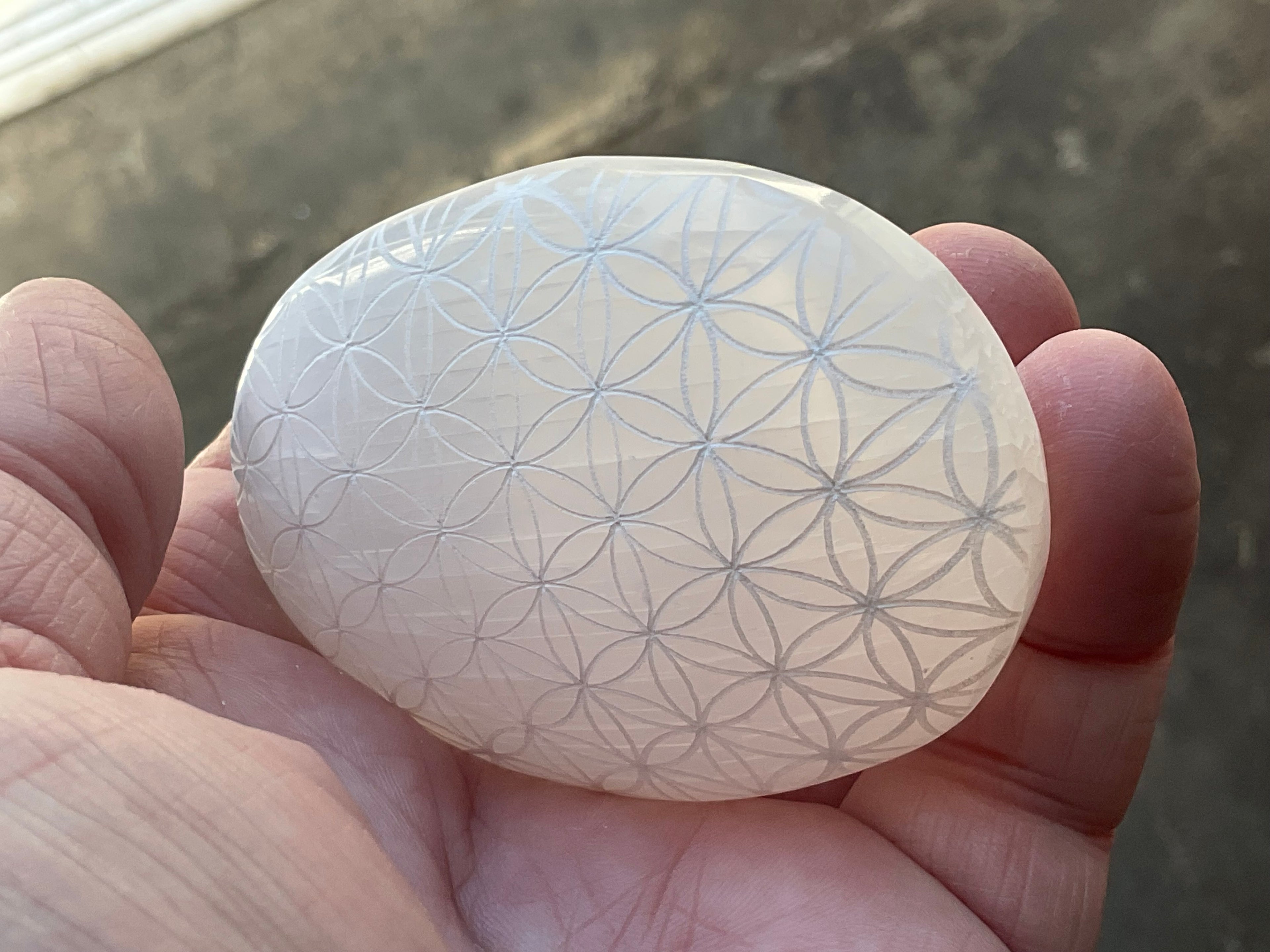115g Flower of Life Etched Selenite Palmstone 1B