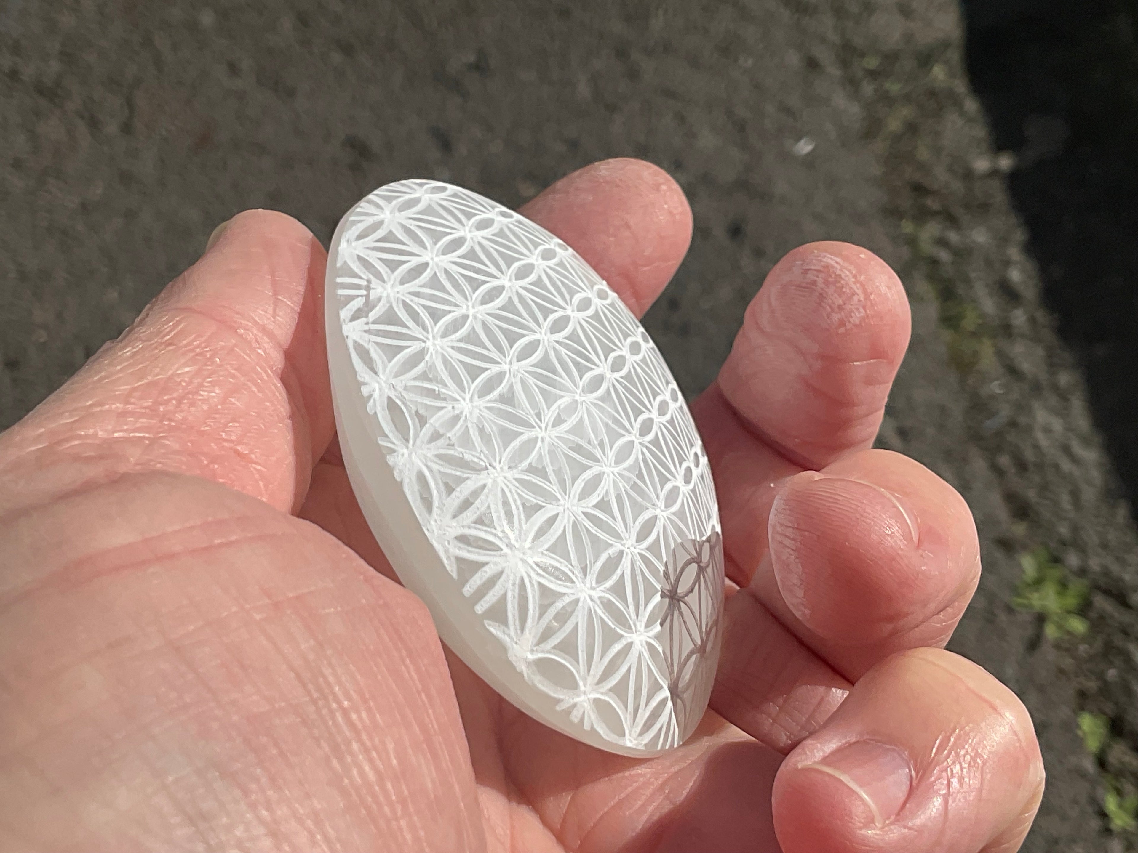 100g Flower of Life Etched Selenite Palmstone 2A