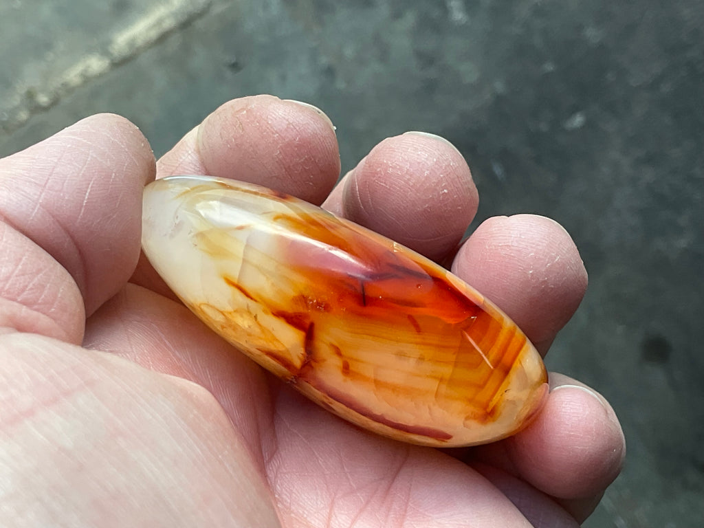 84g Carnelian Palmstone 5A