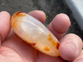84g Carnelian Palmstone 5A