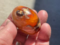66g Carnelian Orca Agate Palmstone 1A