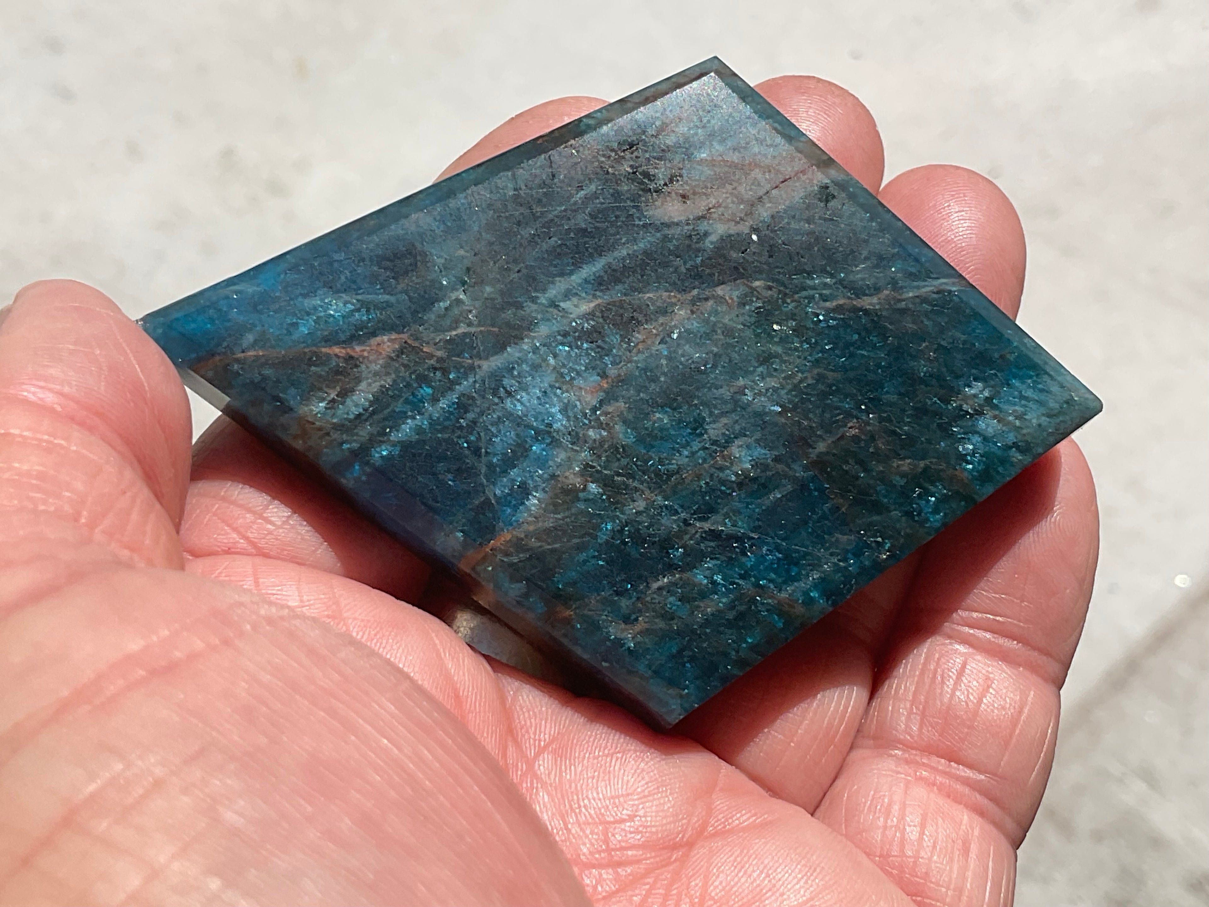 94g Blue Apatite Polished Diamond with stand 4C