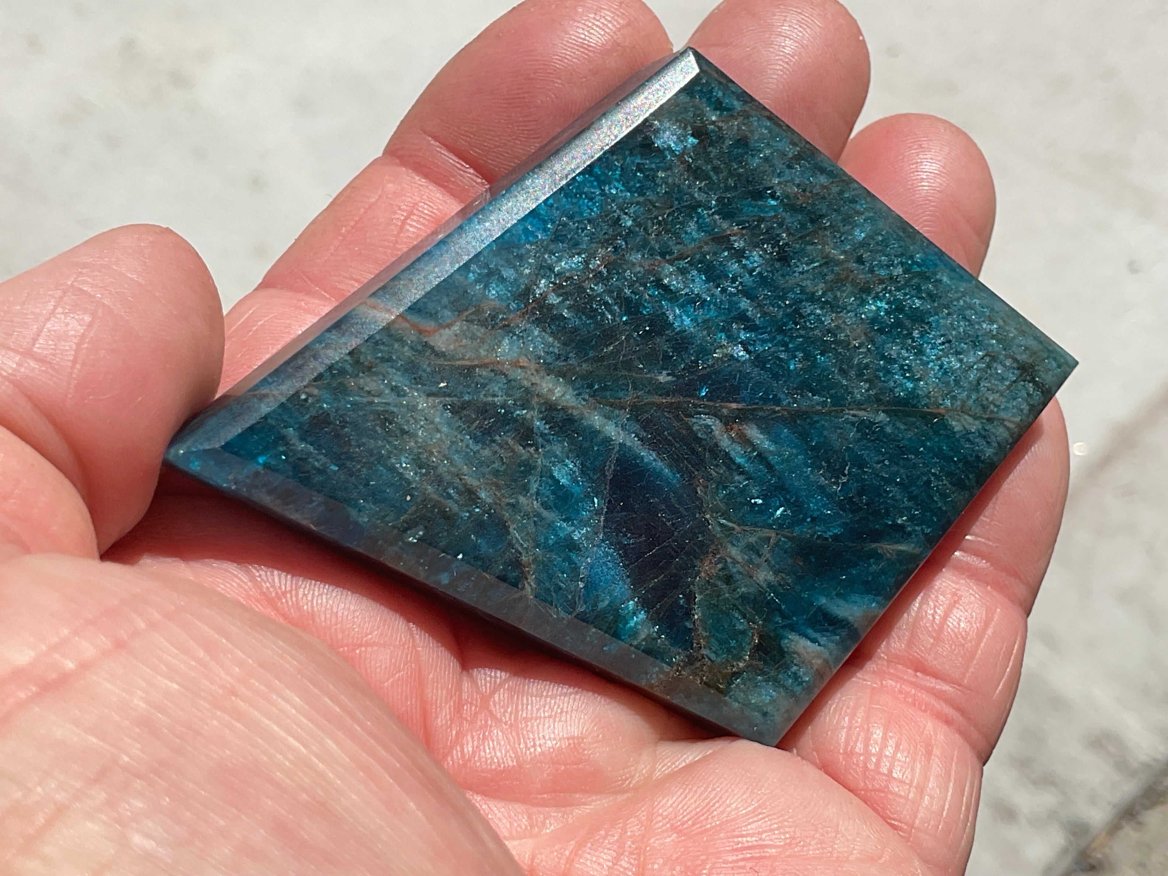 94g Blue Apatite Polished Diamond with stand 4C