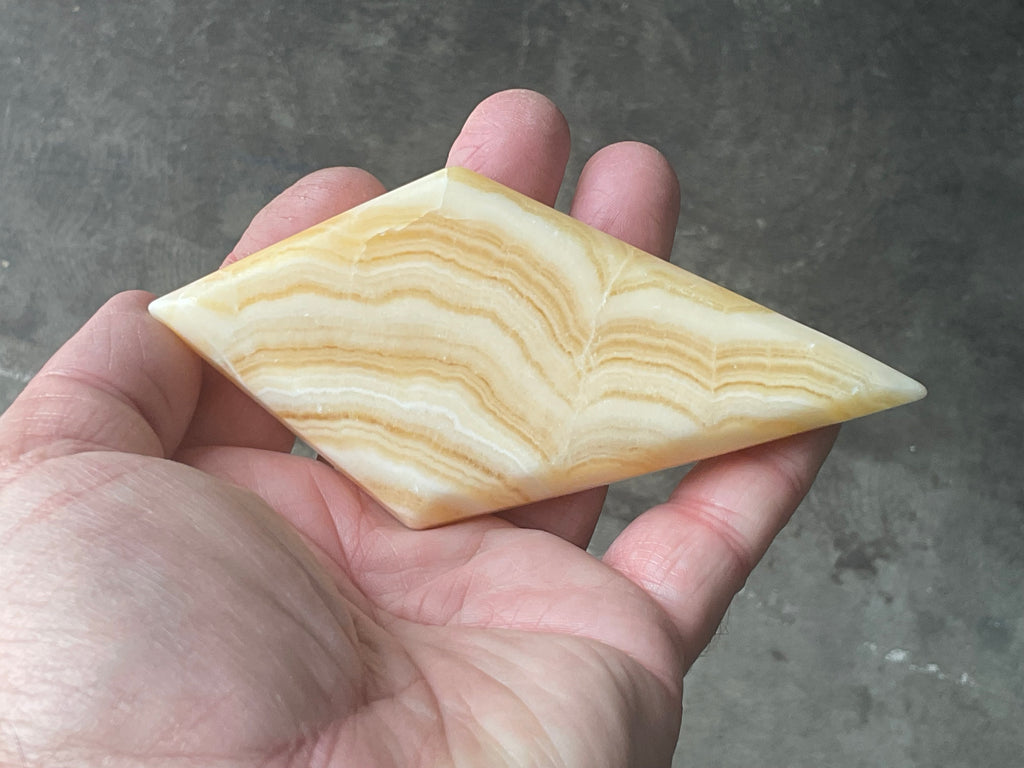 122g Orange Banded Calcite Polished Freeform Diamond 1A