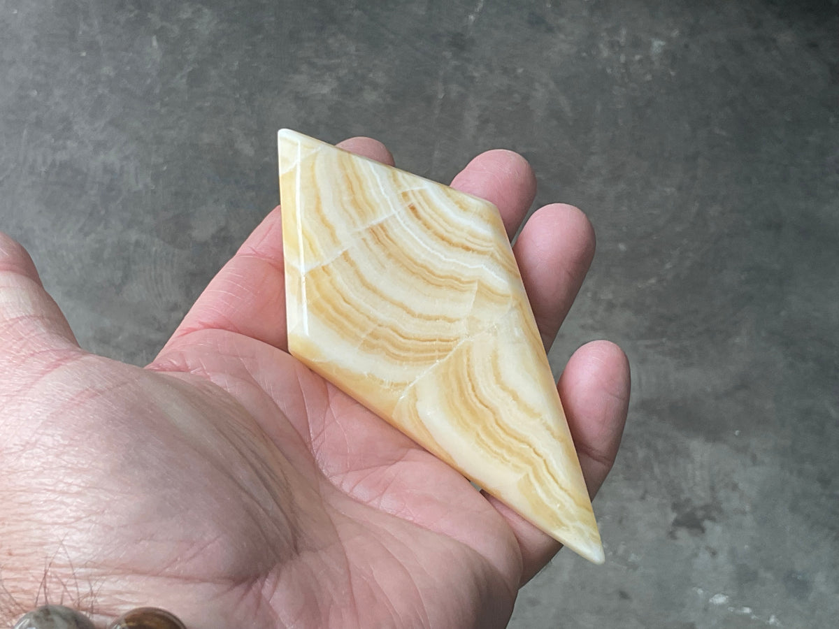 122g Orange Banded Calcite Polished Freeform Diamond 1A