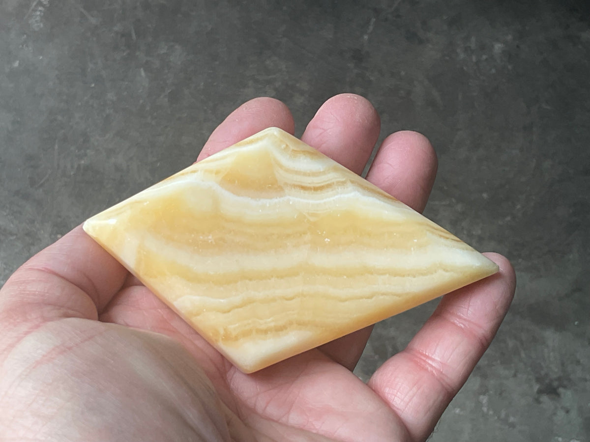 123g Orange Banded Calcite Polished Freeform Diamond 1C