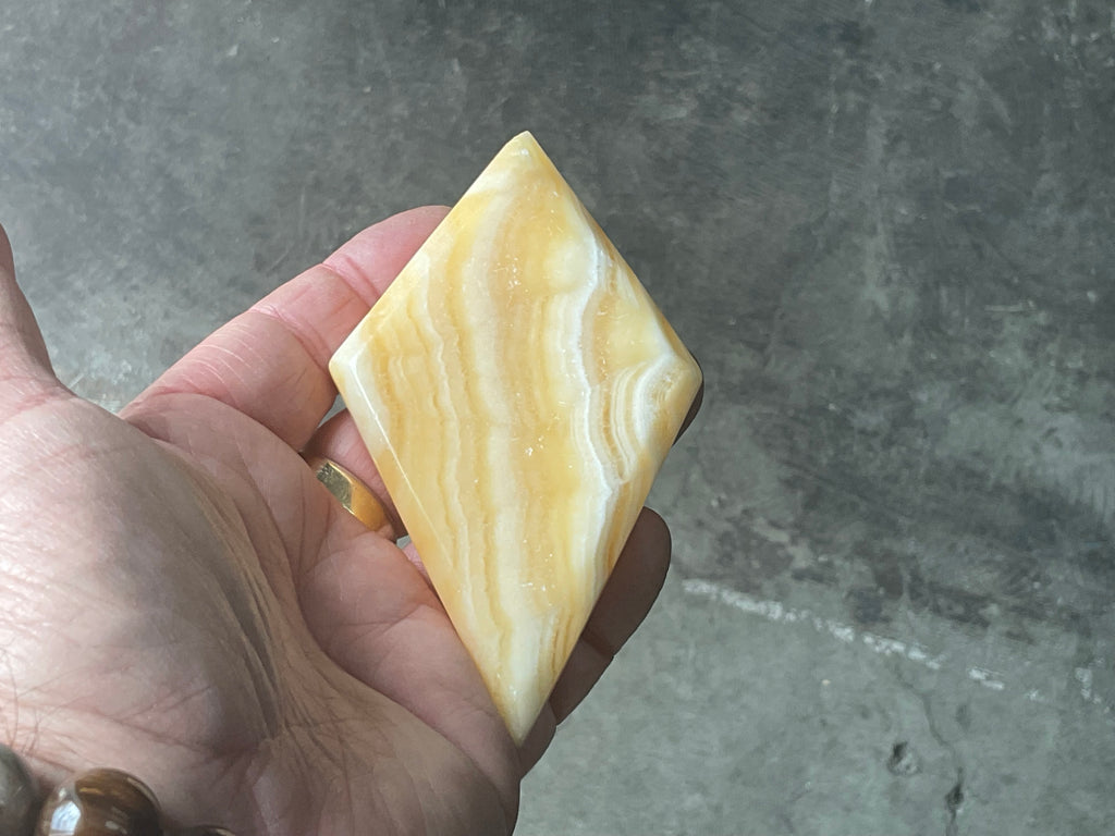 123g Orange Banded Calcite Polished Freeform Diamond 1C