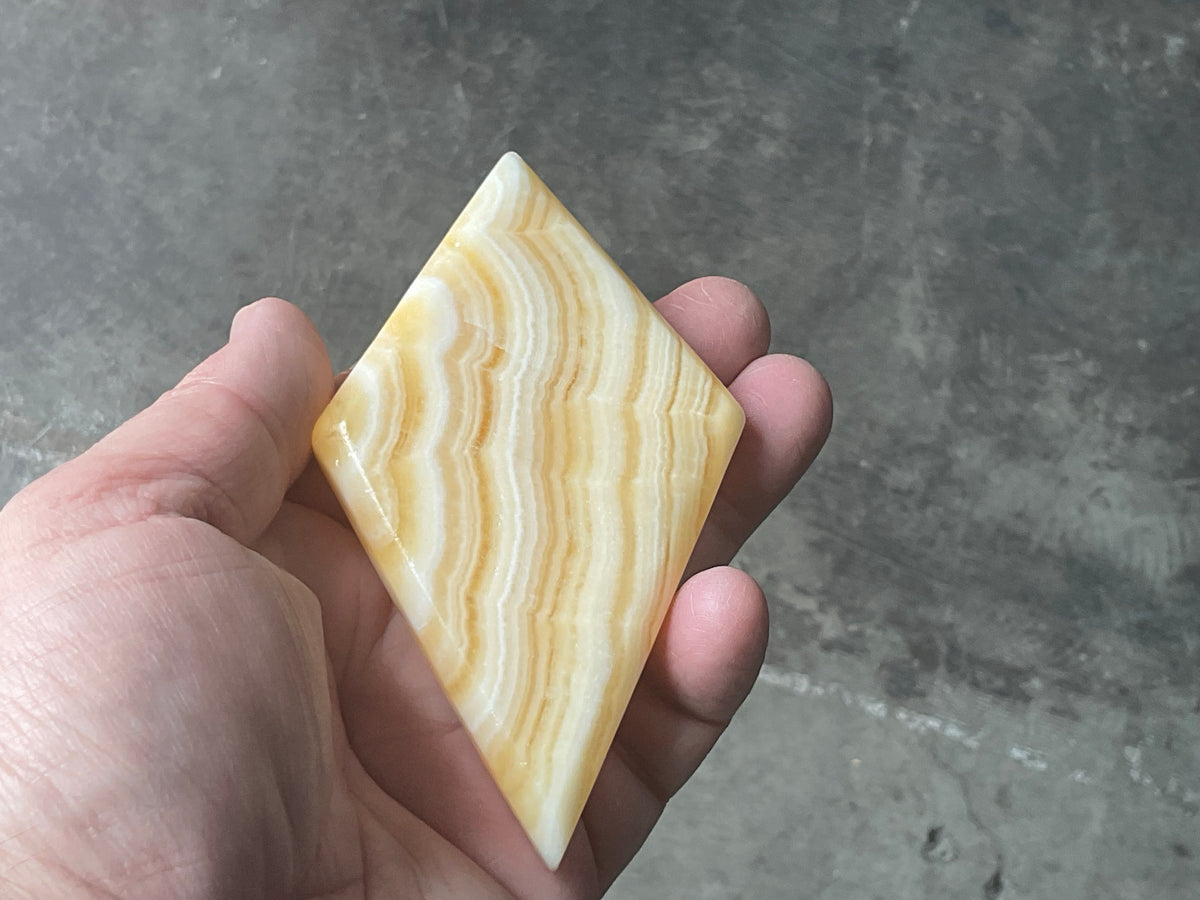123g Orange Banded Calcite Polished Freeform Diamond 1C