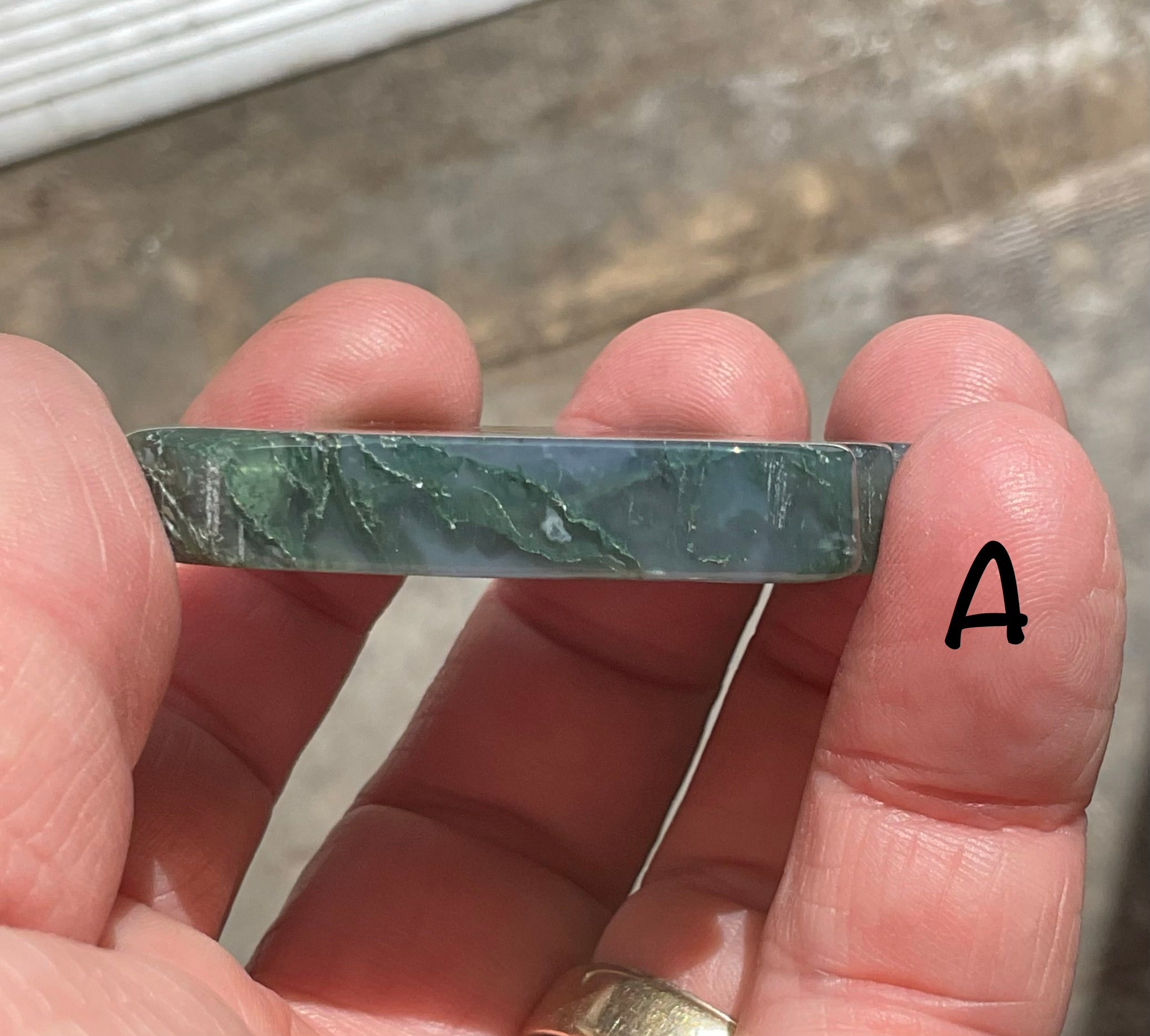 Moss Agate “Man in Moon” Carving Group 1