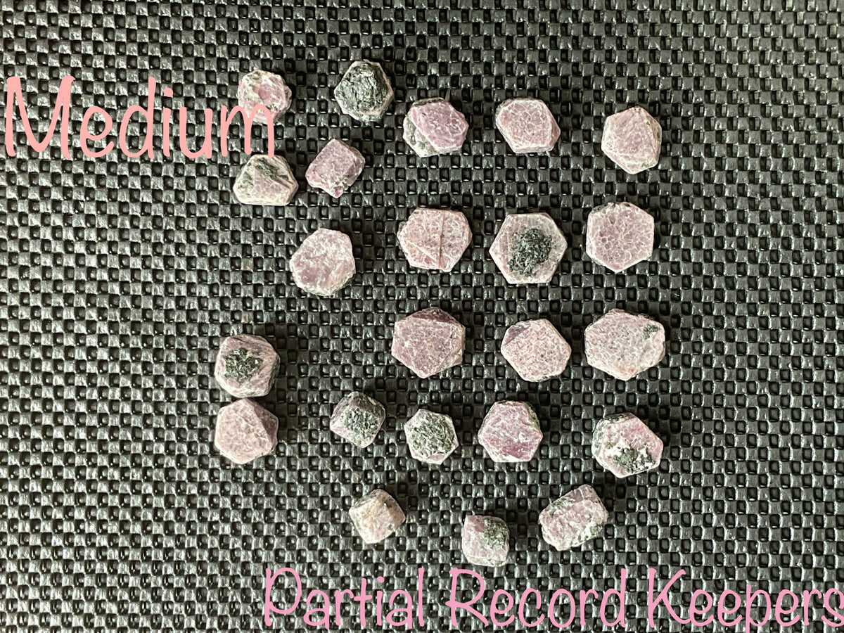 1 piece Medium Corundum (Ruby) Slices with partial “Record Keepers”