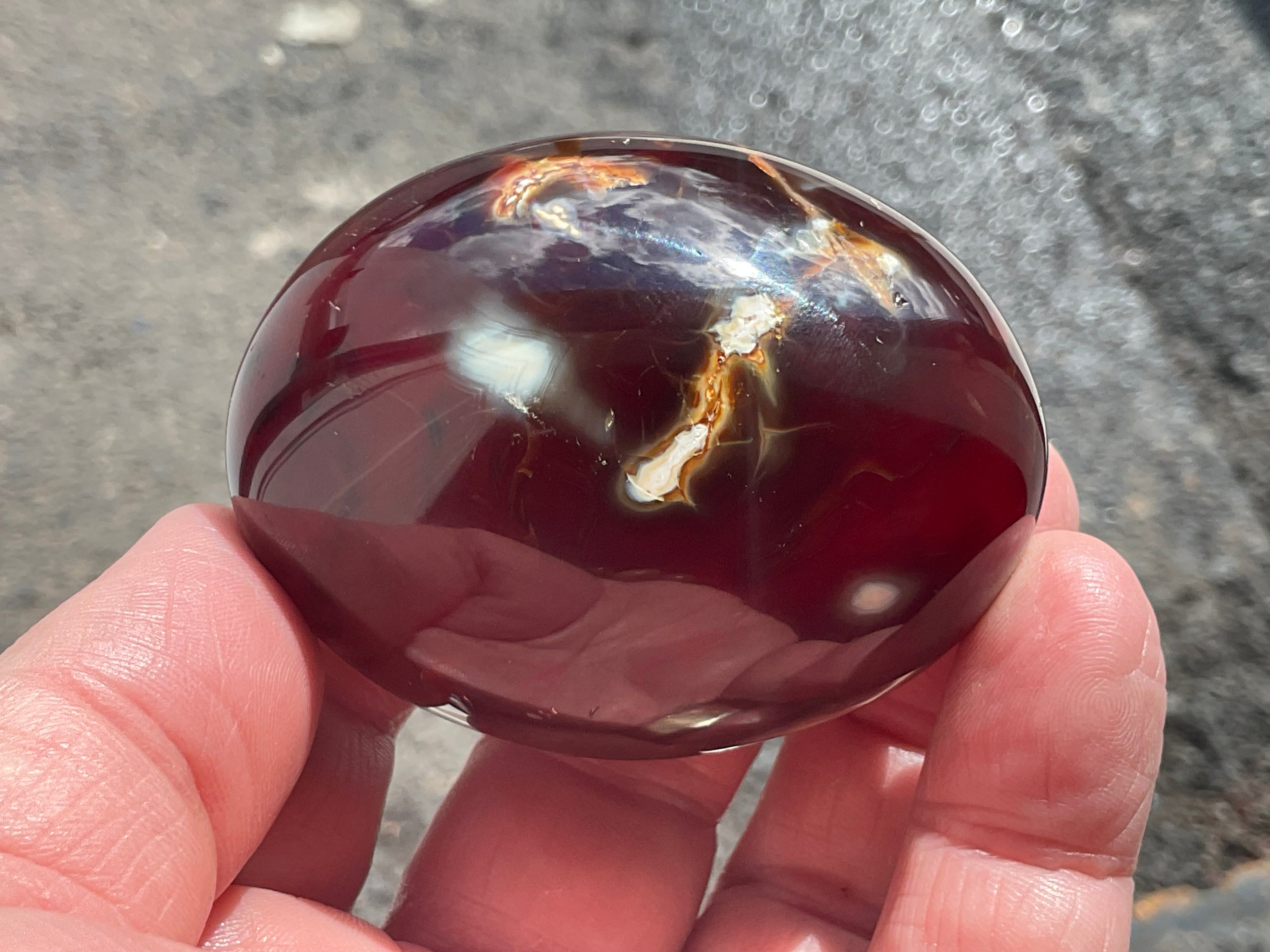 138g Carnelian Orca Agate Palmstone 5A