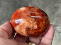 154g Carnelian Orca Agate Palmstone 6A