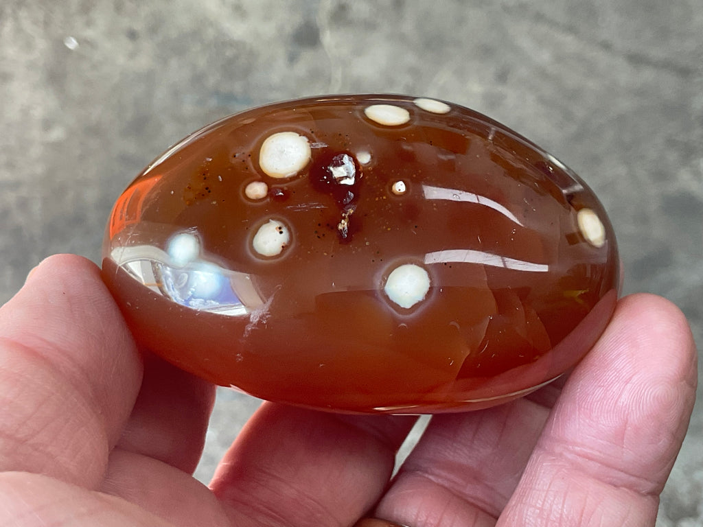 194g Canelian Orca Agate Palmstone 8A