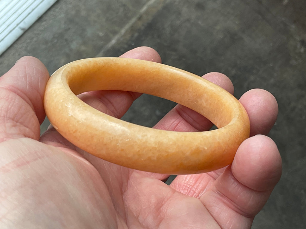 60g Orange Calcite Solid Bangle 3A