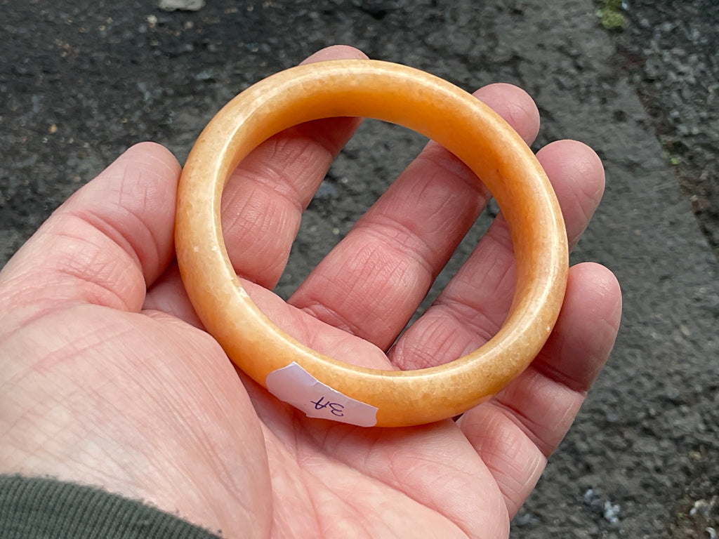 60g Orange Calcite Solid Bangle 3A