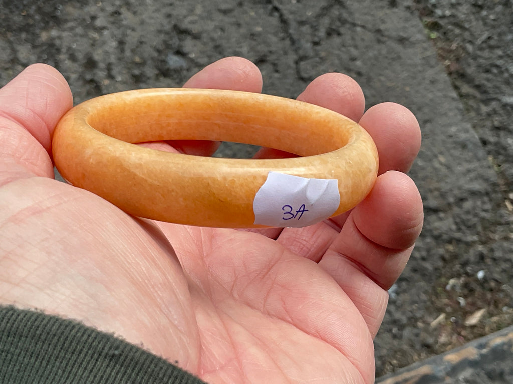 60g Orange Calcite Solid Bangle 3A