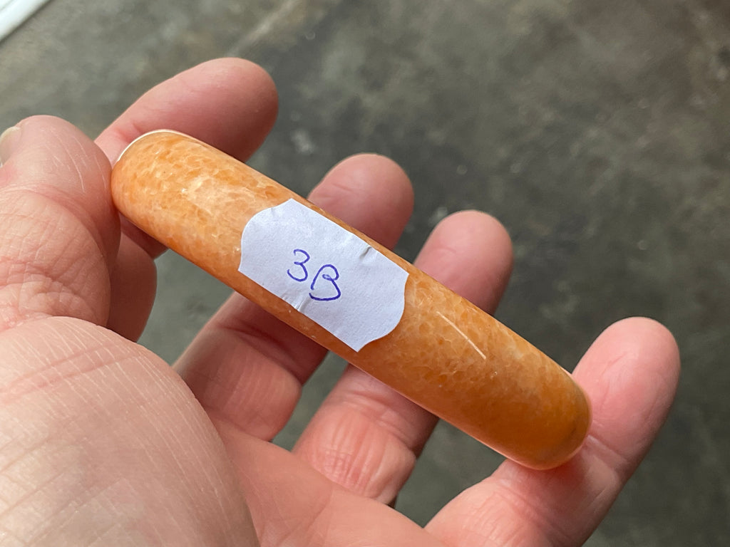 60g Orange Calcite Solid Bangle 3B
