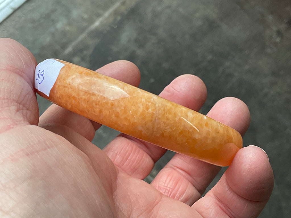 60g Orange Calcite Solid Bangle 3B