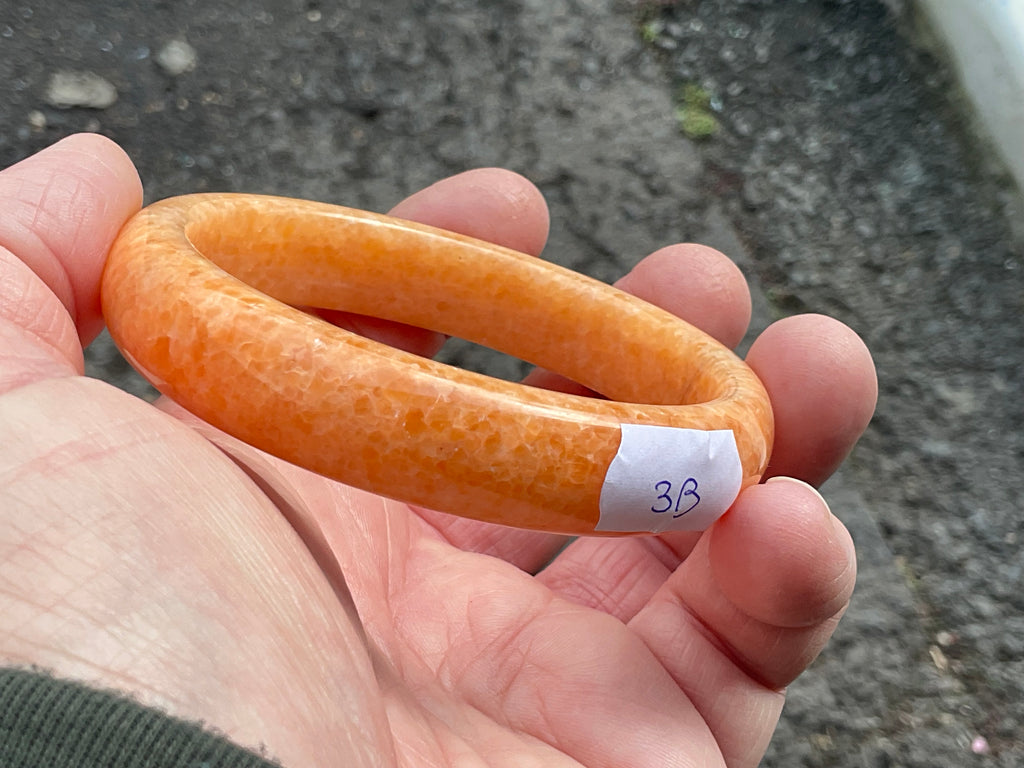 60g Orange Calcite Solid Bangle 3B