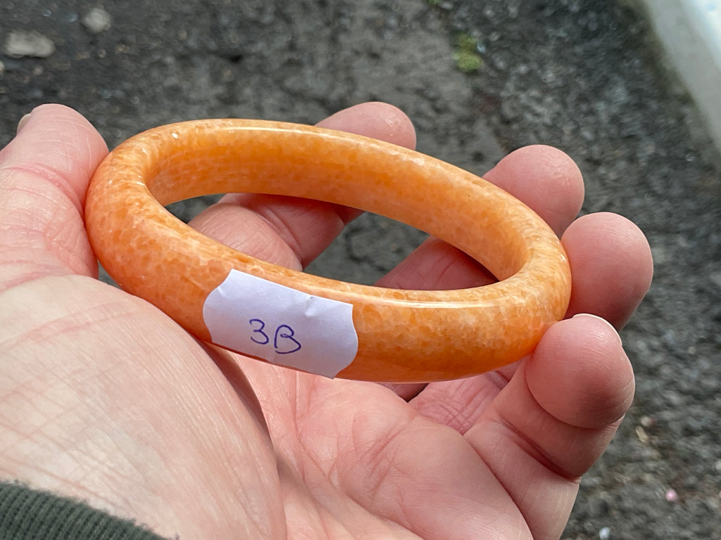 60g Orange Calcite Solid Bangle 3B