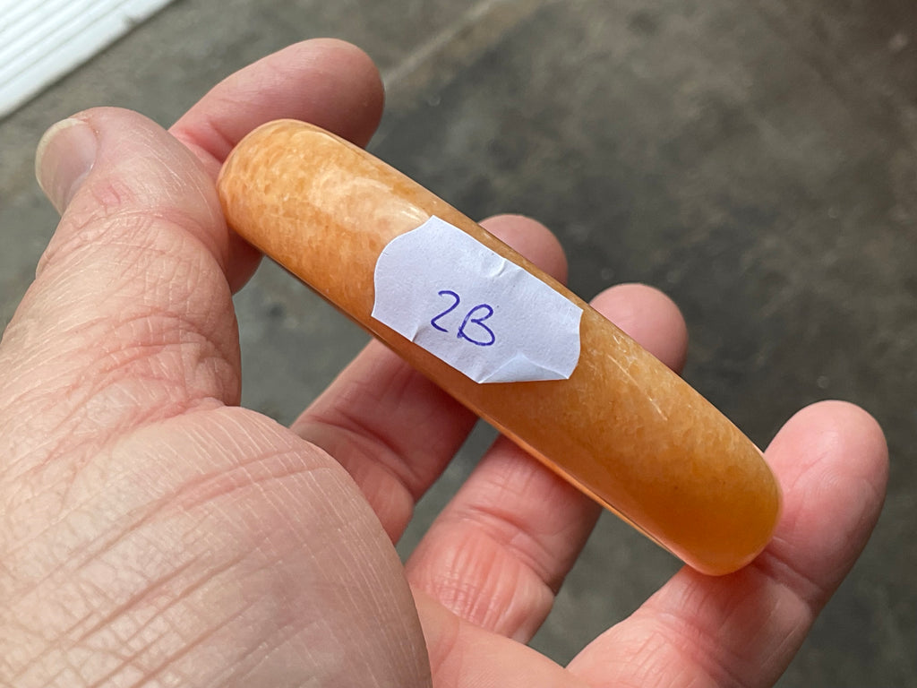 58g Orange Calcite Solid Bangle 2B