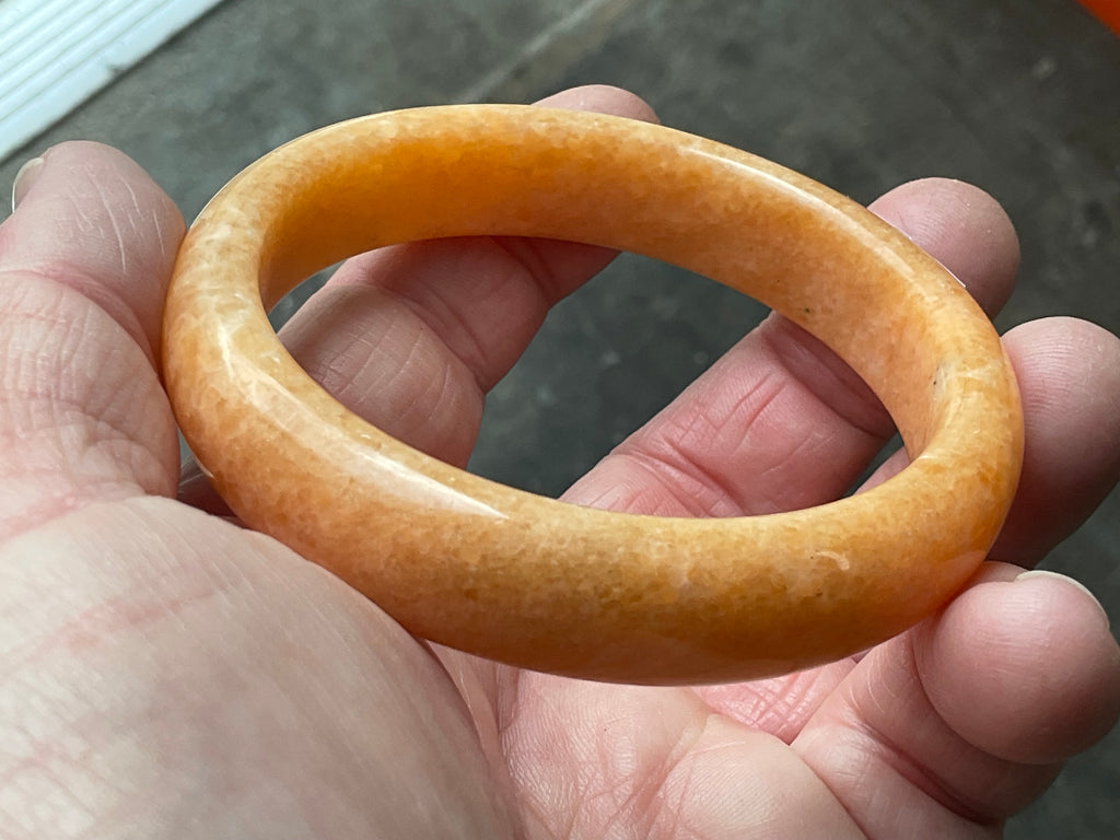 58g Orange Calcite Solid Bangle 2B