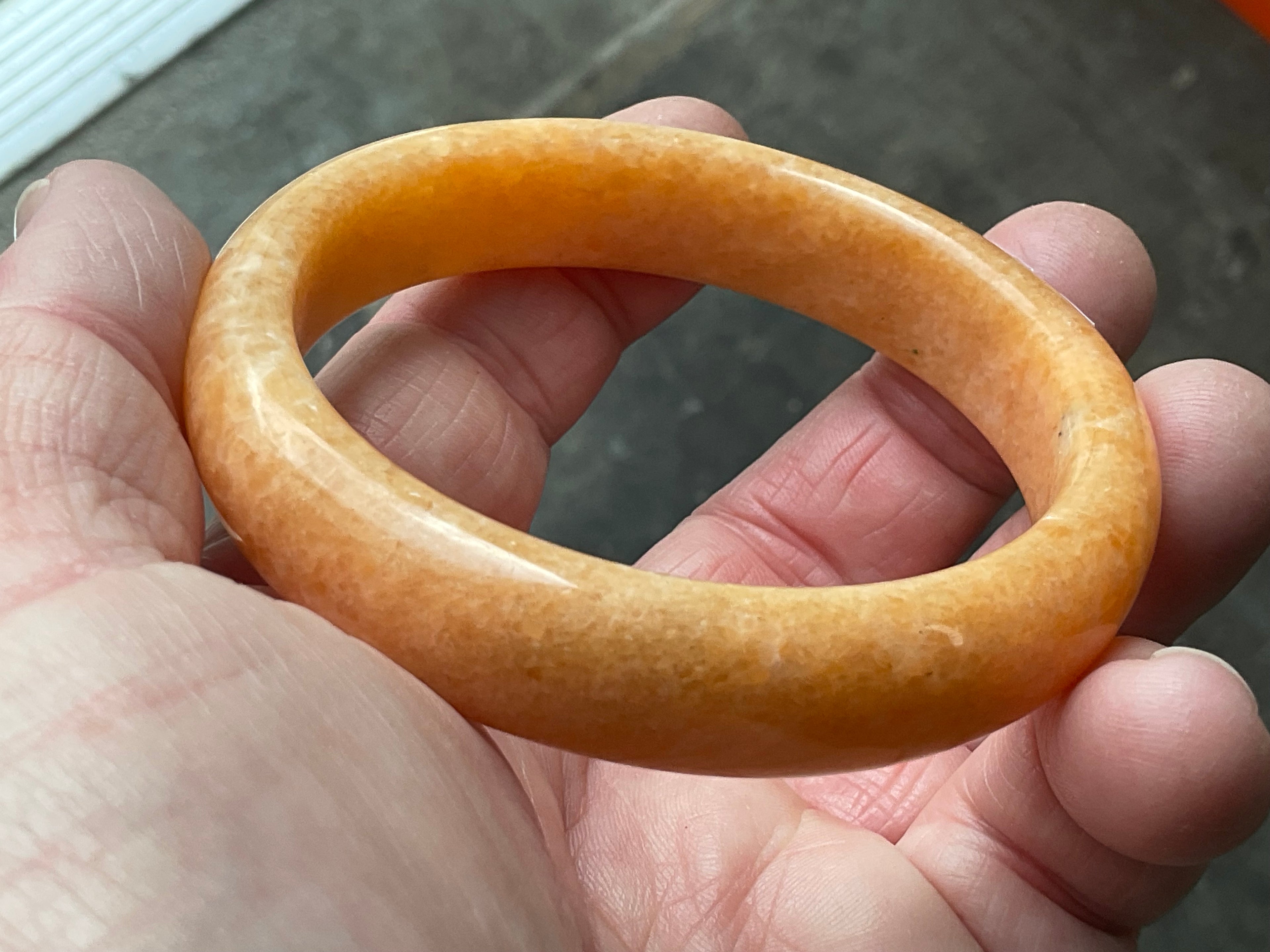 58g Orange Calcite Solid Bangle 2B