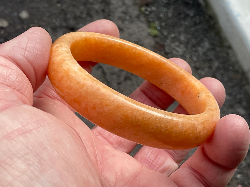 58g Orange Calcite Solid Bangle 2B