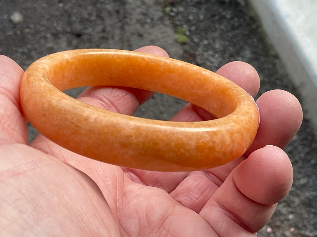 58g Orange Calcite Solid Bangle 2B