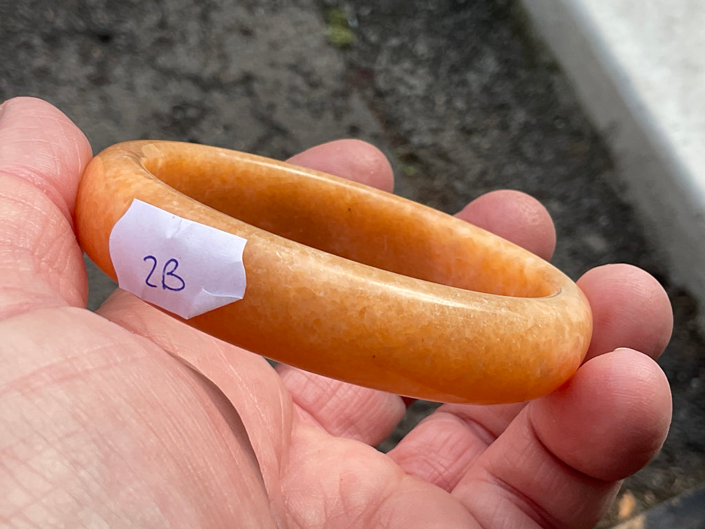 58g Orange Calcite Solid Bangle 2B