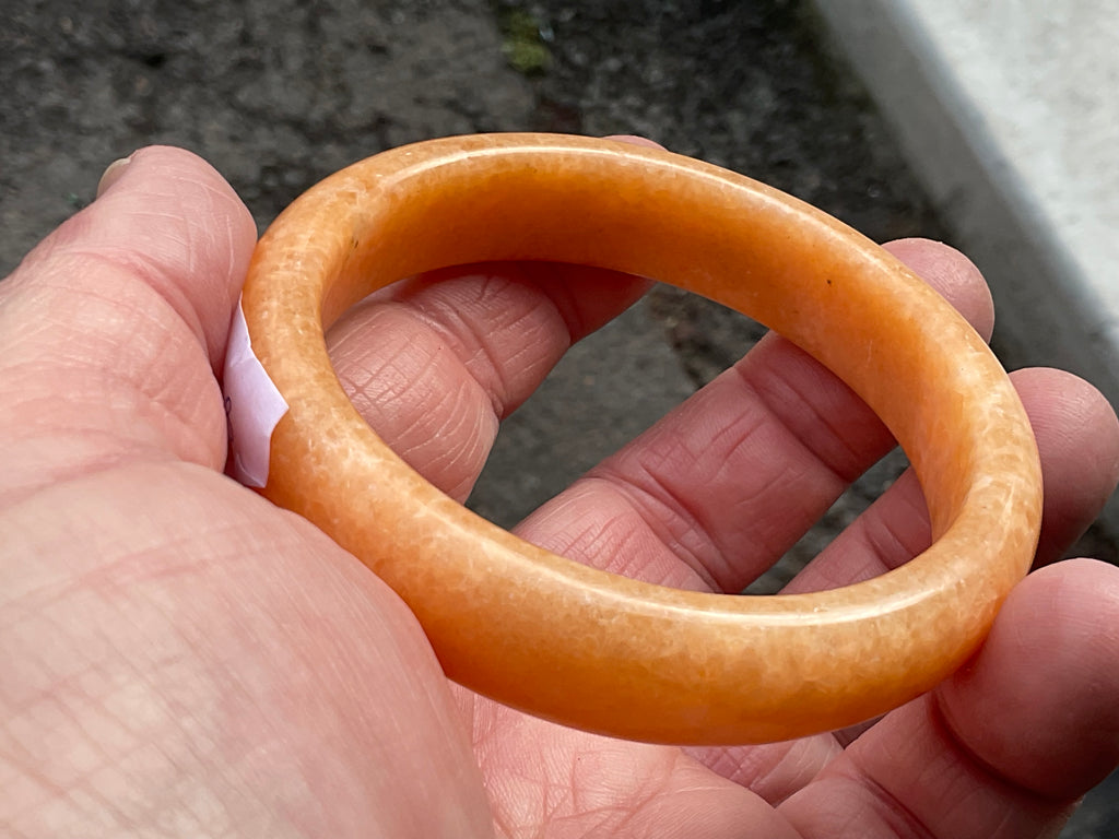 58g Orange Calcite Solid Bangle 2B