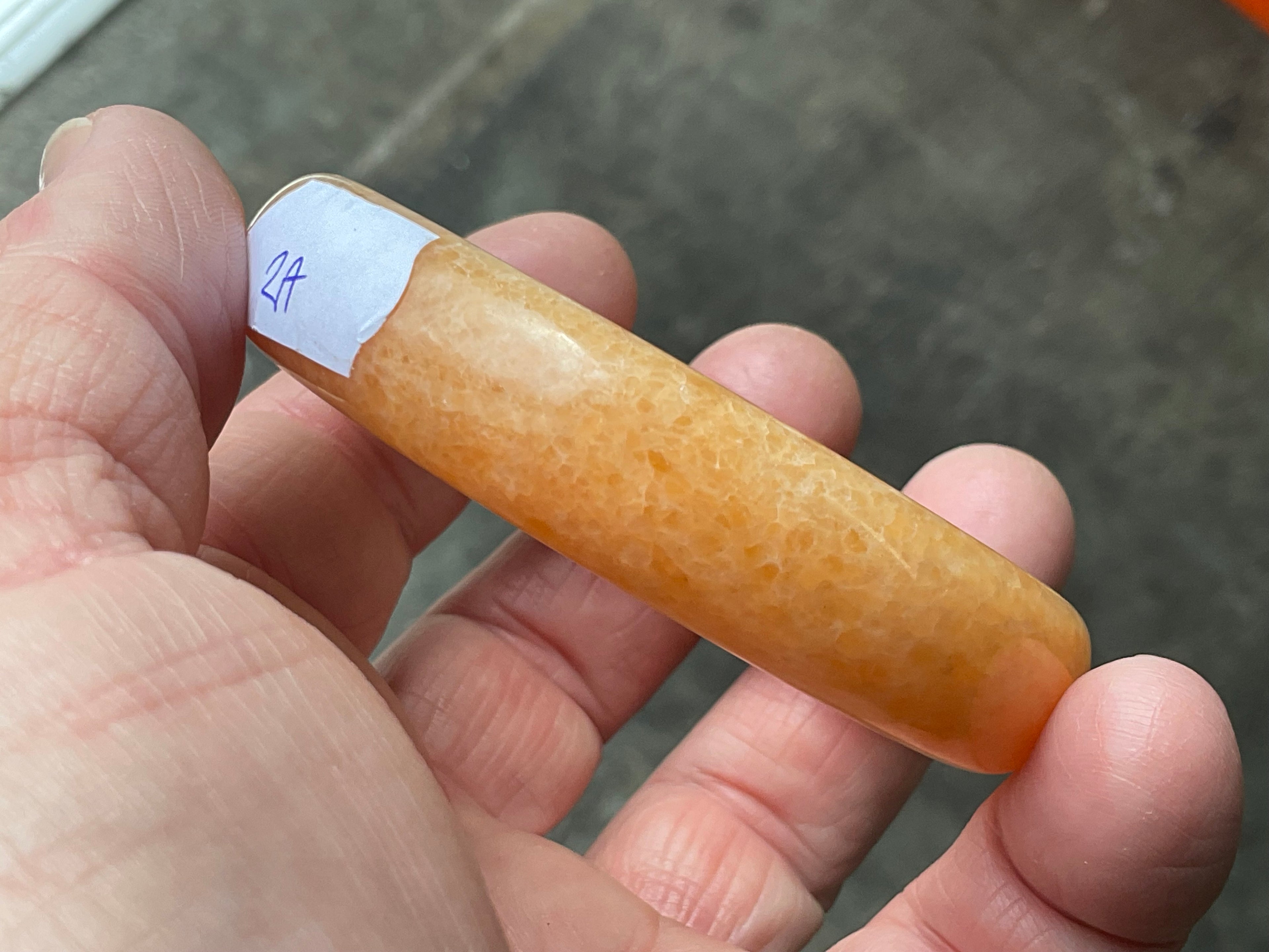 48g Orange Calcite Solid Bangle 2A