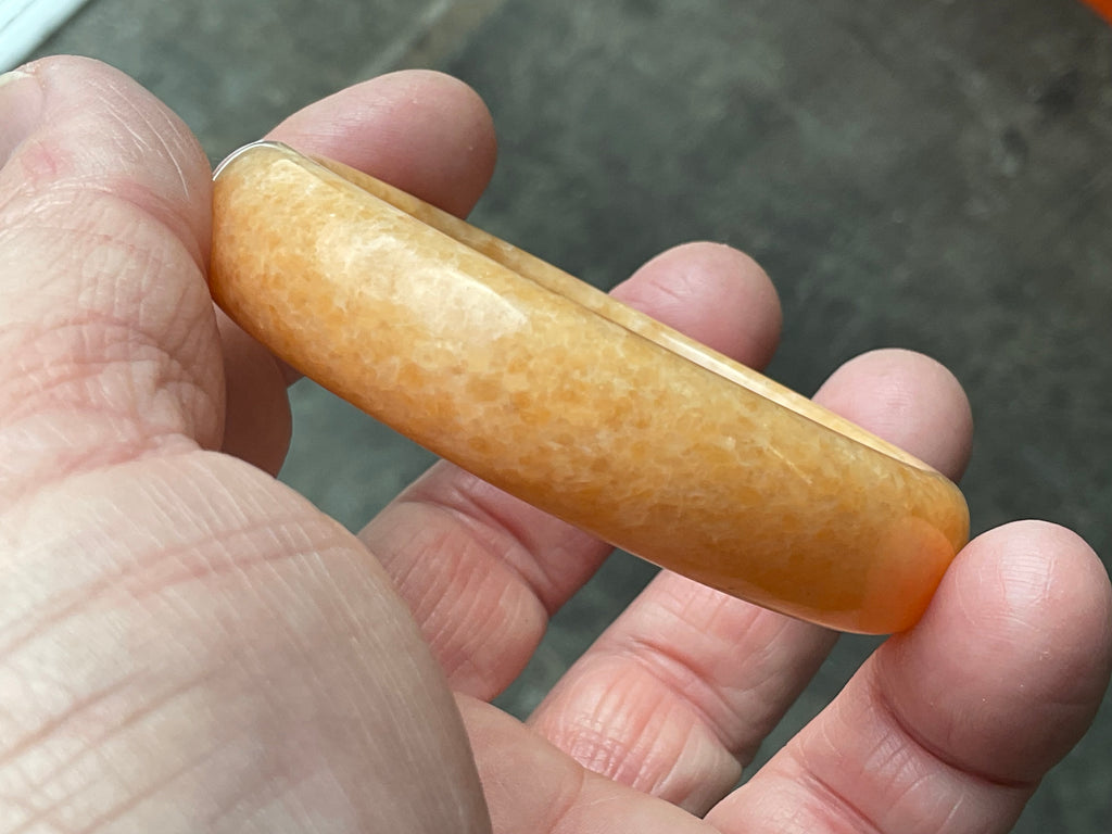 48g Orange Calcite Solid Bangle 2A