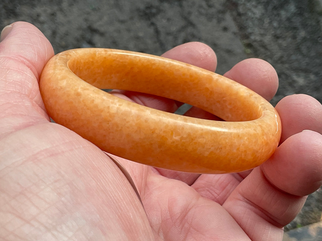 48g Orange Calcite Solid Bangle 2A