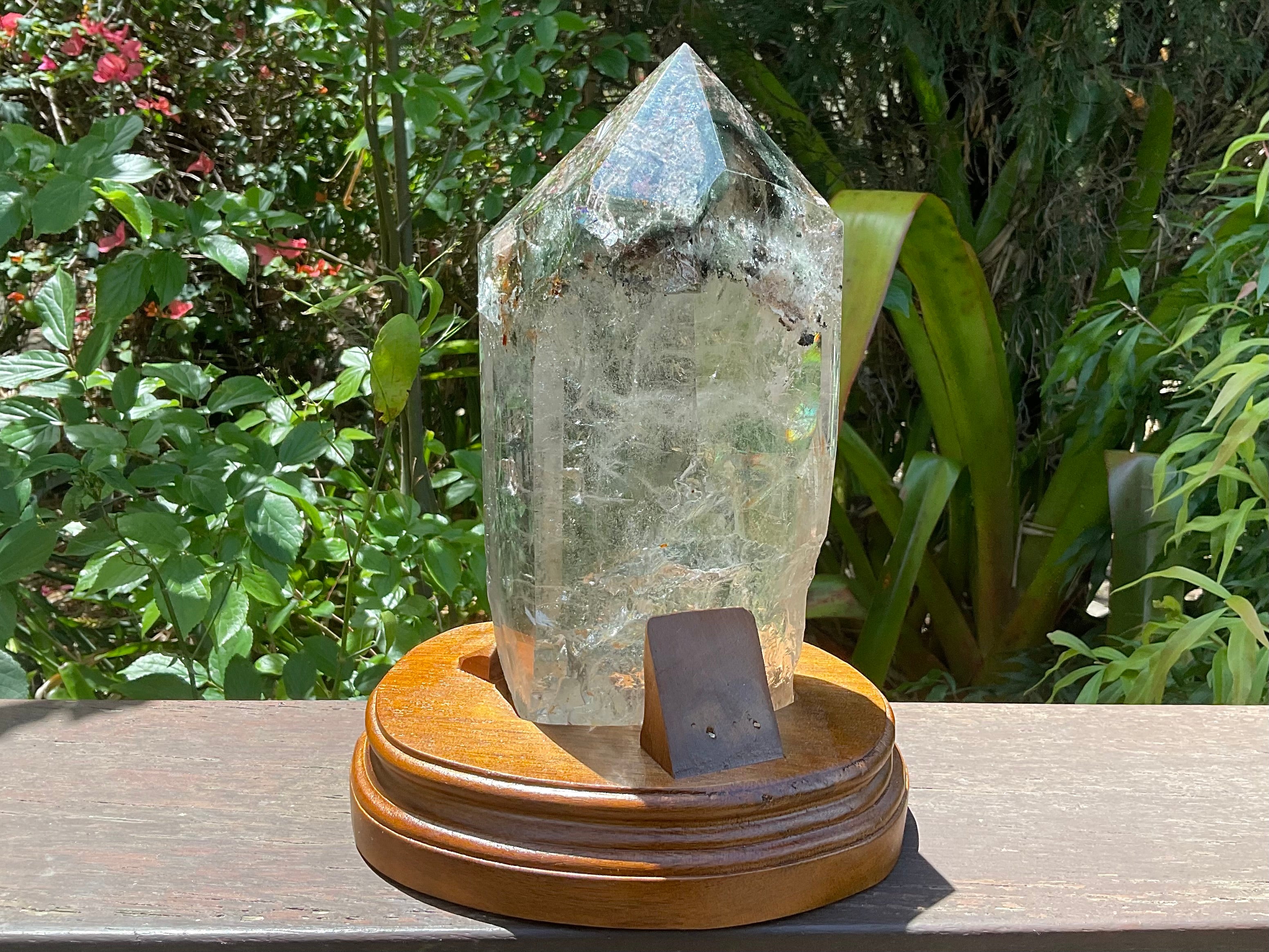 2788g XXL Garden Quartz Polished Point with custom wooden stand.