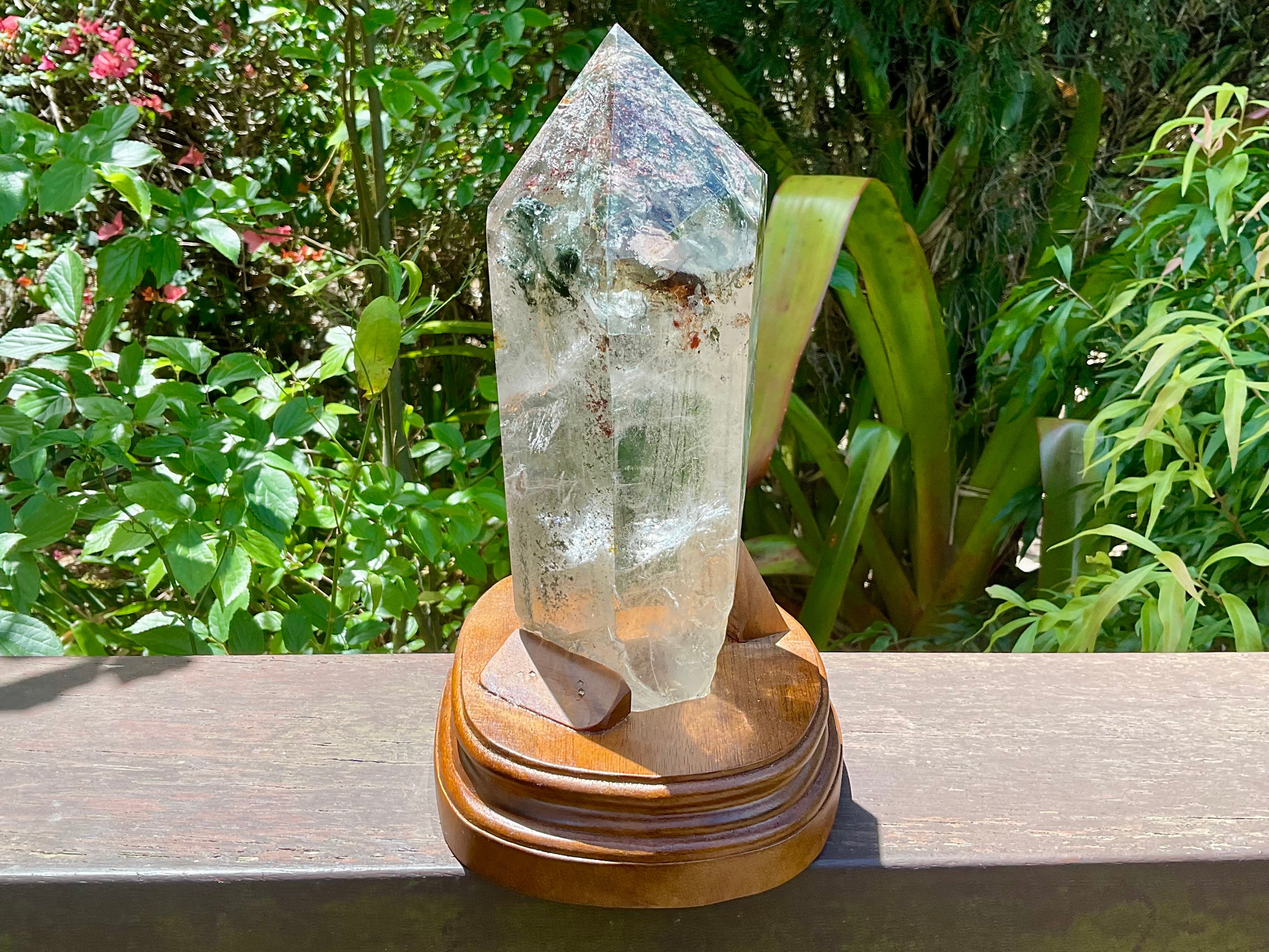 2788g XXL Garden Quartz Polished Point with custom wooden stand.