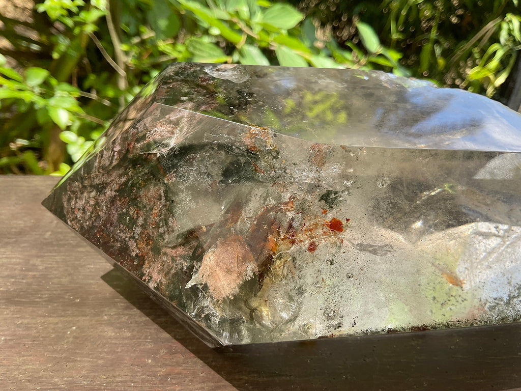 2788g XXL Garden Quartz Polished Point with custom wooden stand.