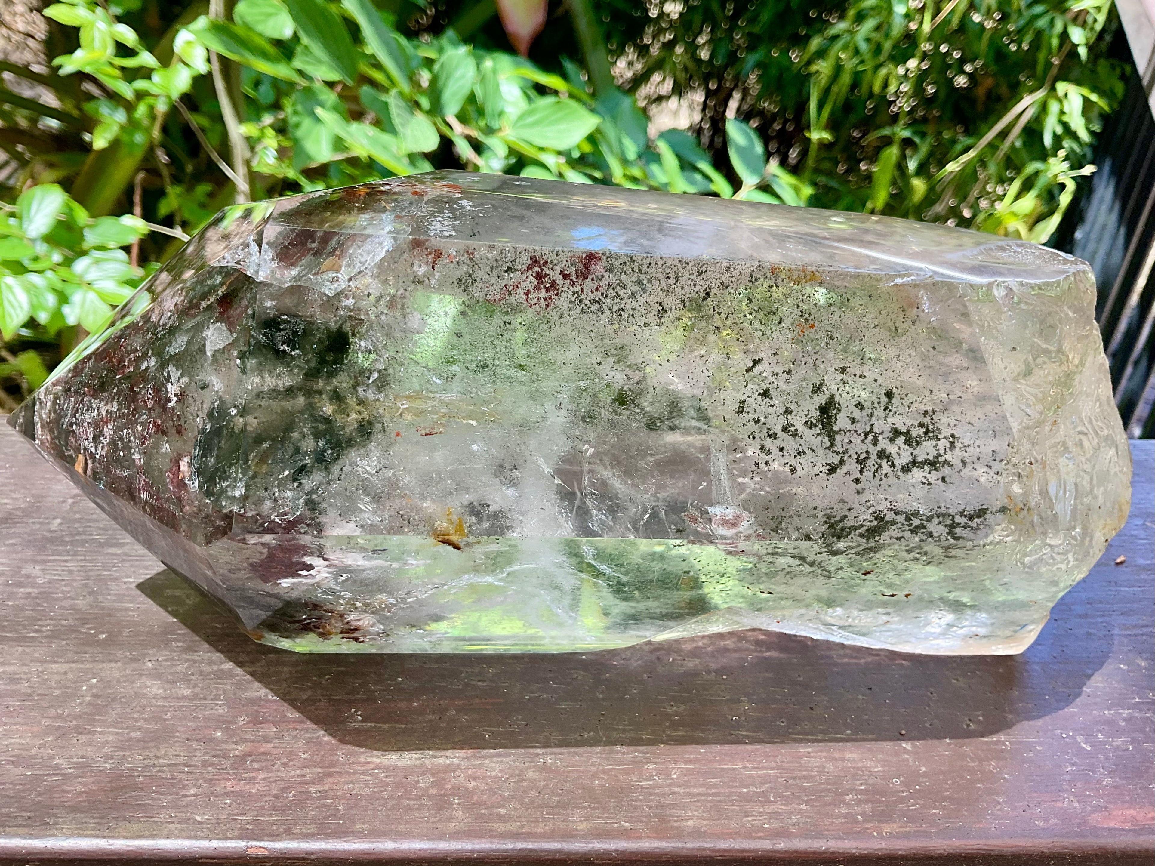 2788g XXL Garden Quartz Polished Point with custom wooden stand.