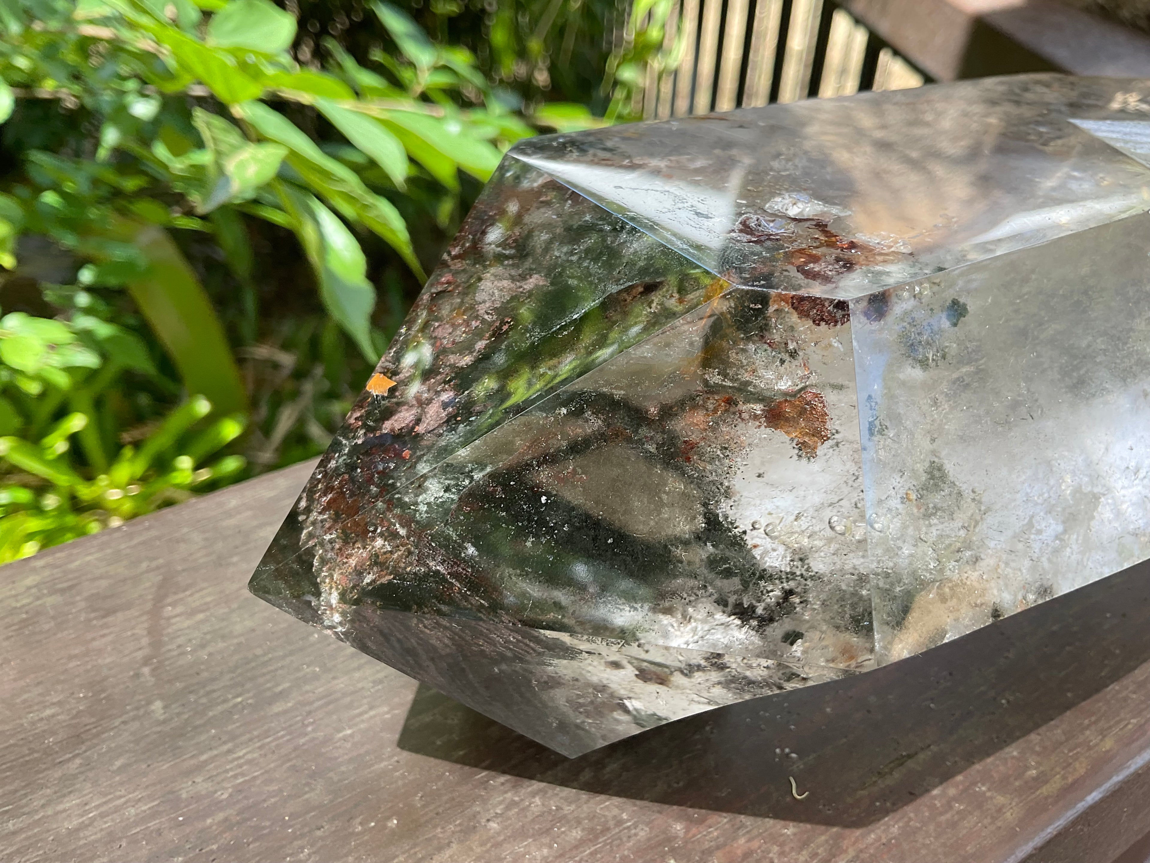 2788g XXL Garden Quartz Polished Point with custom wooden stand.