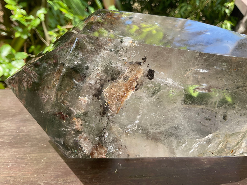 2788g XXL Garden Quartz Polished Point with custom wooden stand.