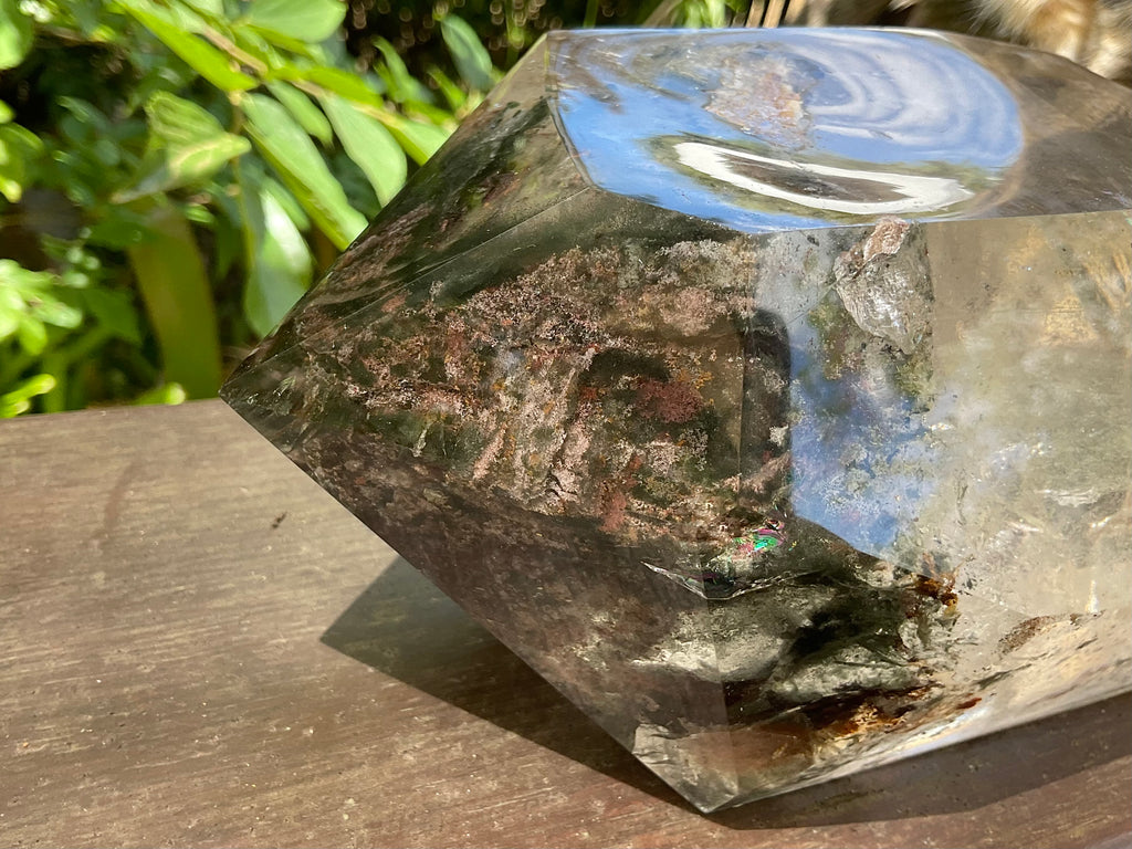 2788g XXL Garden Quartz Polished Point with custom wooden stand.