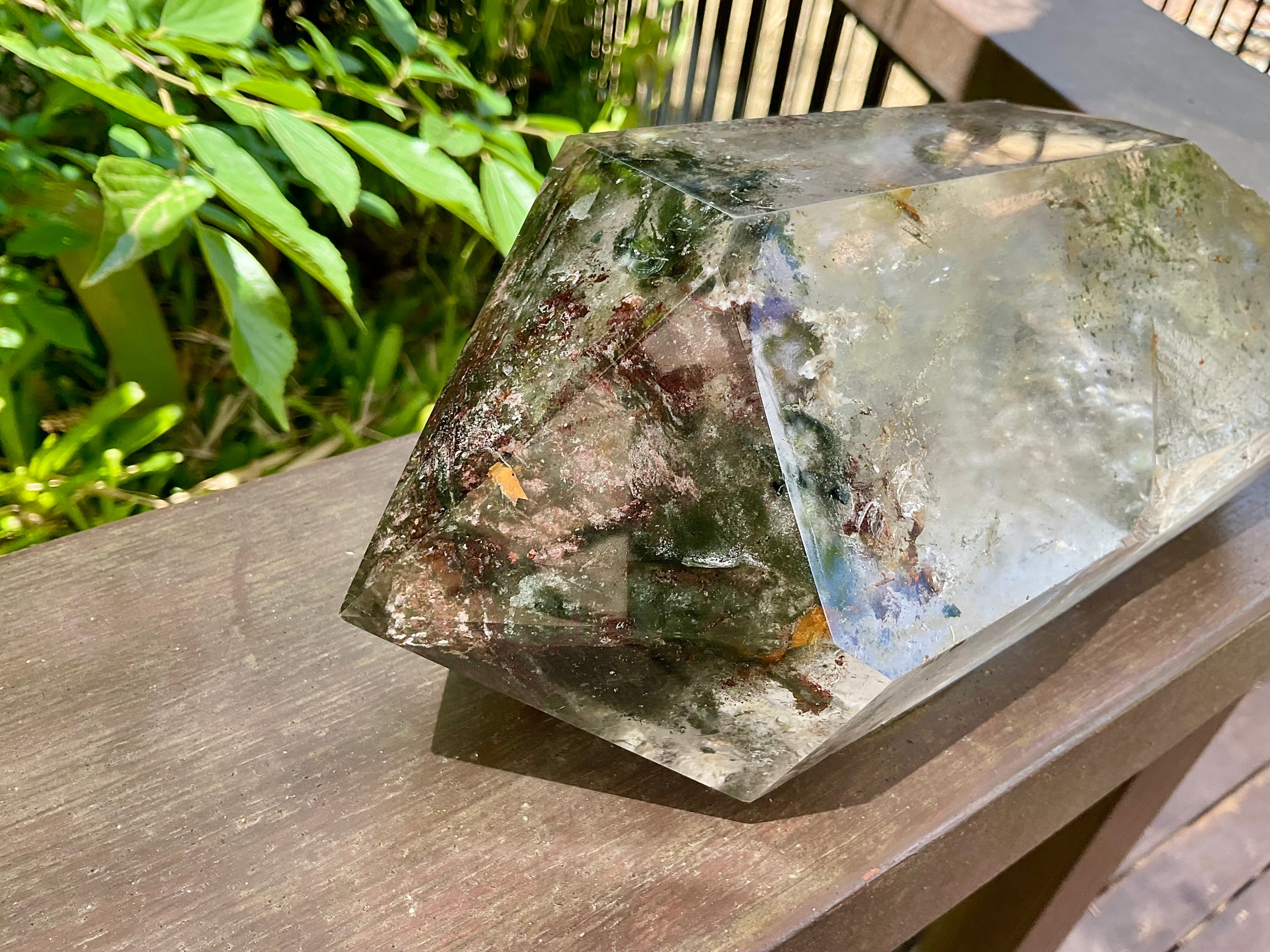 2788g XXL Garden Quartz Polished Point with custom wooden stand.